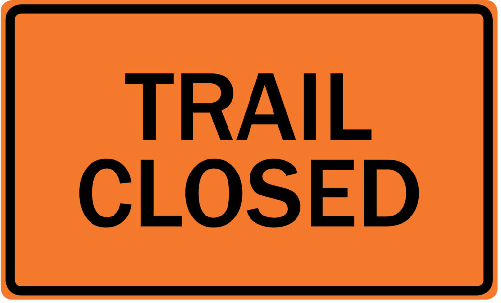 "Trail closed" road sign