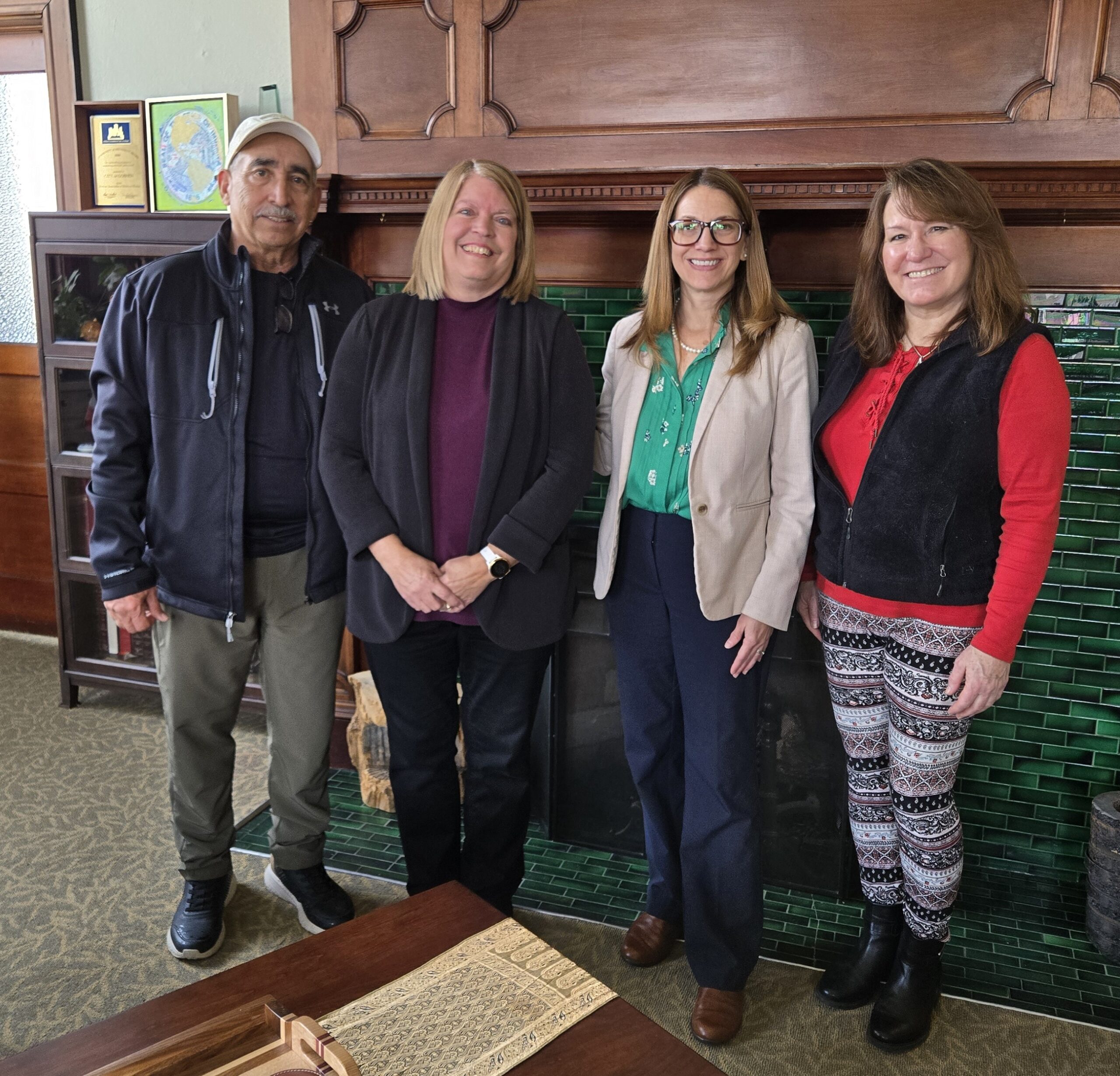 From left, Art and Carol Razo, Mayor Gina Leichty and Val Collins meet at City Hall.