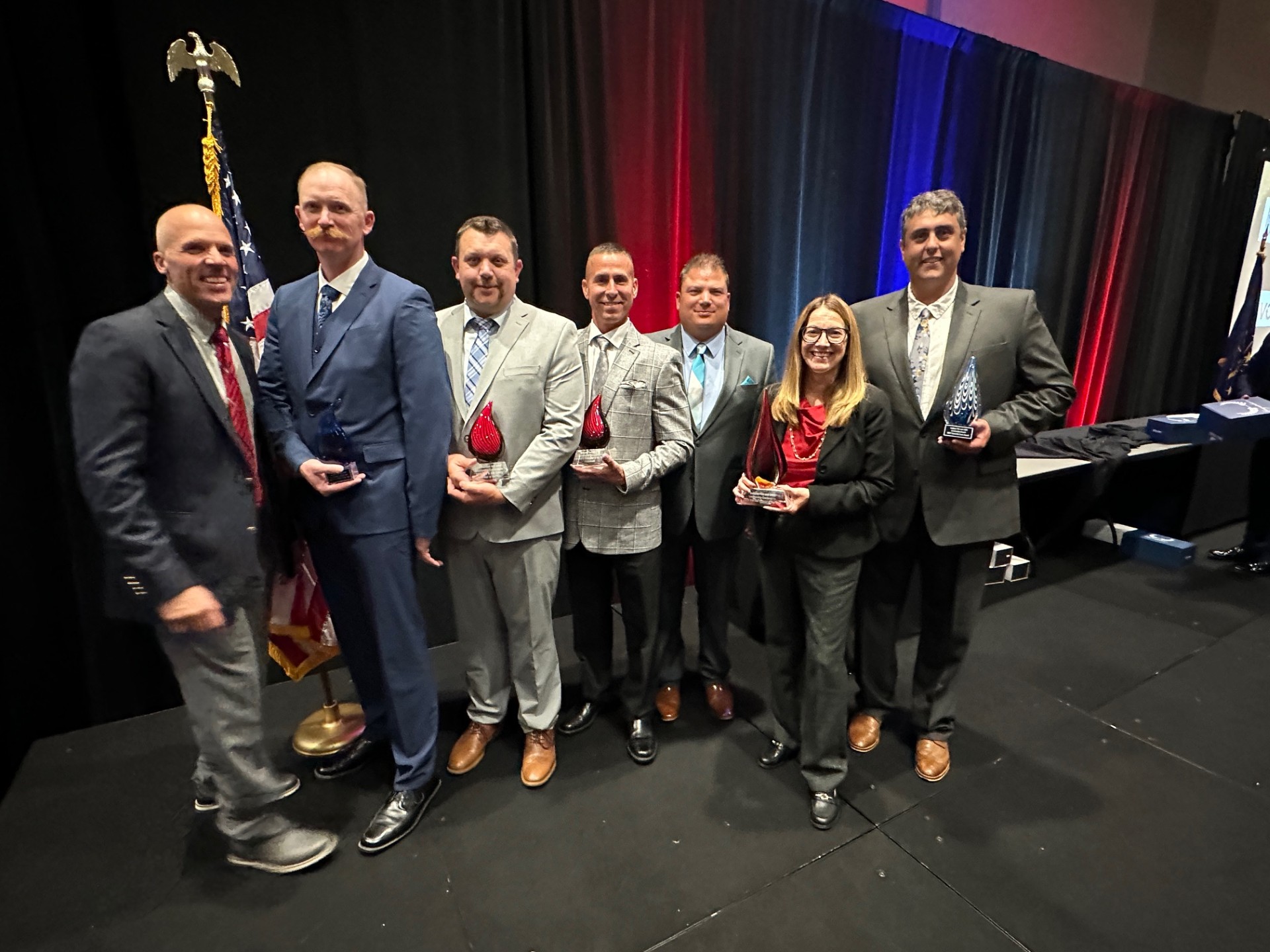Pictured, from left are Assistant Goshen Fire Chief Steffen Schrock, GFD Division Chief Michael Hamby, Sgt. Charles Stevens, Division Chief Travis Peak, Fire Chief Anthony Powell, Goshen Mayor Gina Leichty and EMS Supervisor Andrew Priem.